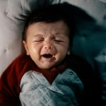 why newborn babies cry