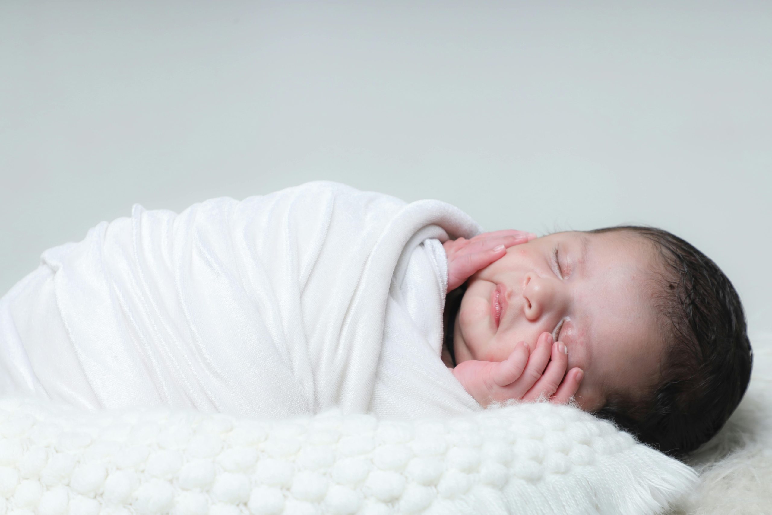 Why Do Newborns Smile in Their Sleep?
